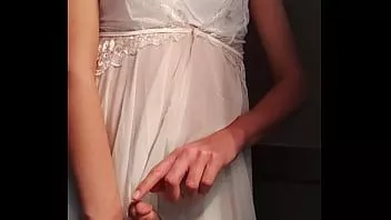 Play Femboy cums hands free using angelical clothes